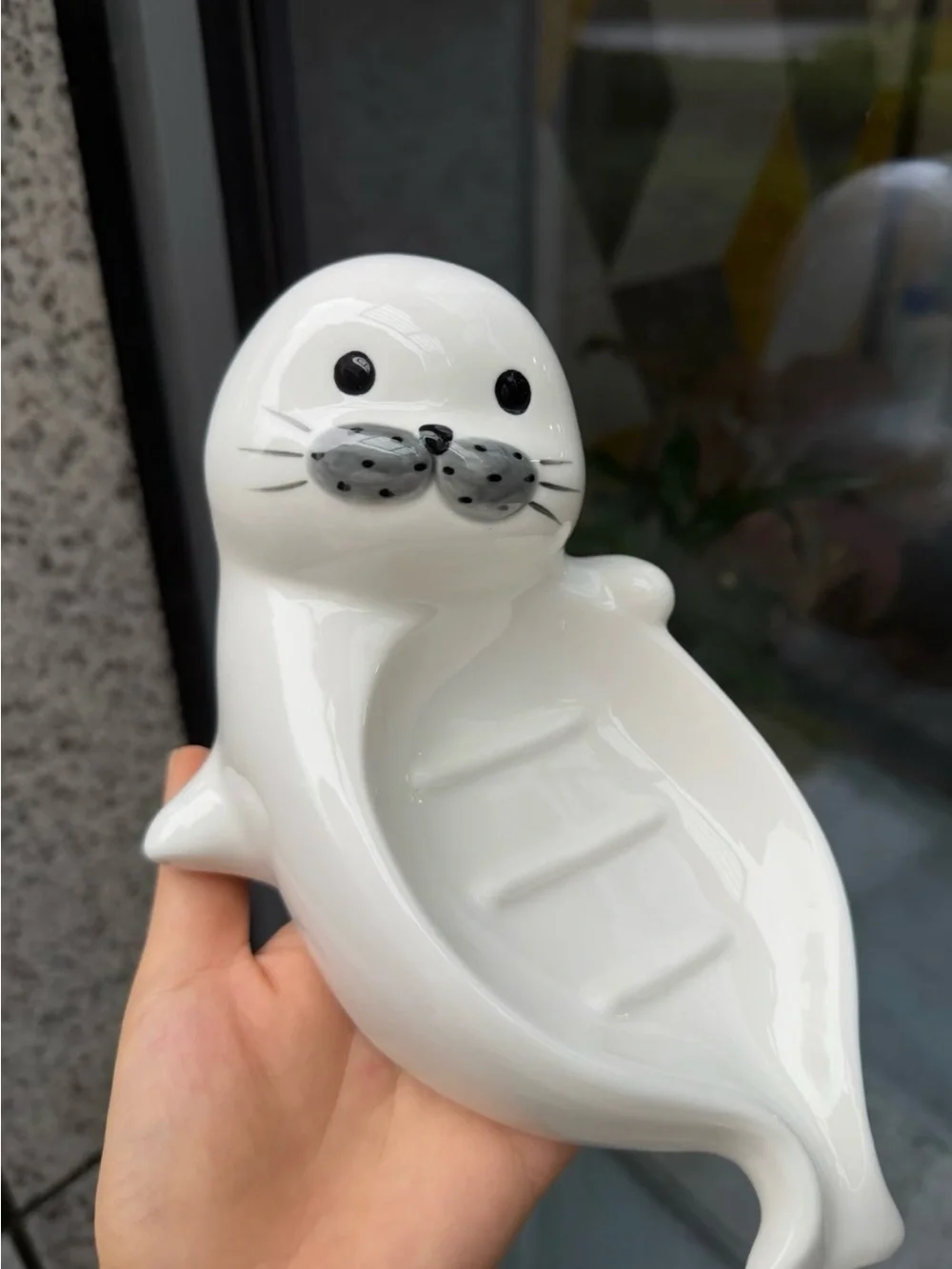 Ceramic Seal Soap Dish in White with light blue soap
